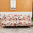 Husa elastica universala pentru canapea si pat,verde cu flori galbene, 90 x 140 cm - BUZ.RO