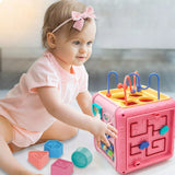 Jucarie interactiva si educativa tip cub, 6in1, multifunctional, diferite jocuri, activitati, figuri geometrice, angrenaje rotative, forme de sortat, din plastic, roz