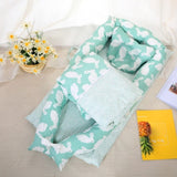 Set patut portabil, bebe baby nest cu lenjerie, perna, bumper protectie anti - alunecare, verde cu iepuri gri - BUZ.RO